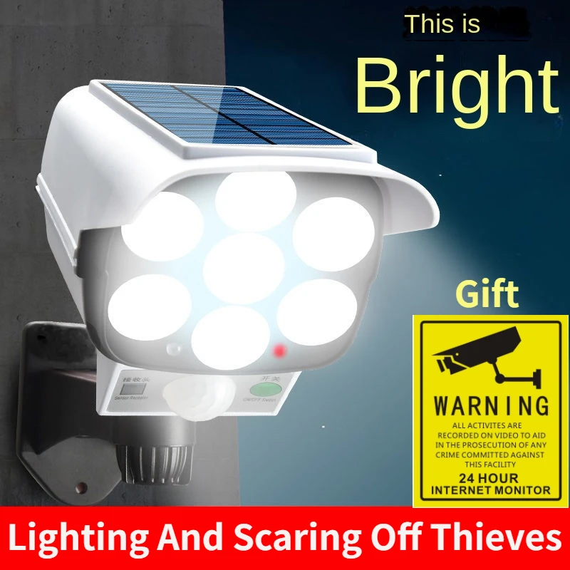 Outdoor Lighting Motion Sensor - 屋外ソーラーライトモーションセンサーセキュリティダミーカメラワイヤレスフラッドライトIP65防水77 LEDランプ3モード家庭菜園用